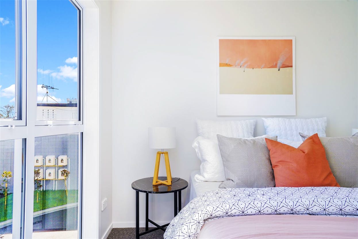 Spacious bedroom with modern furniture